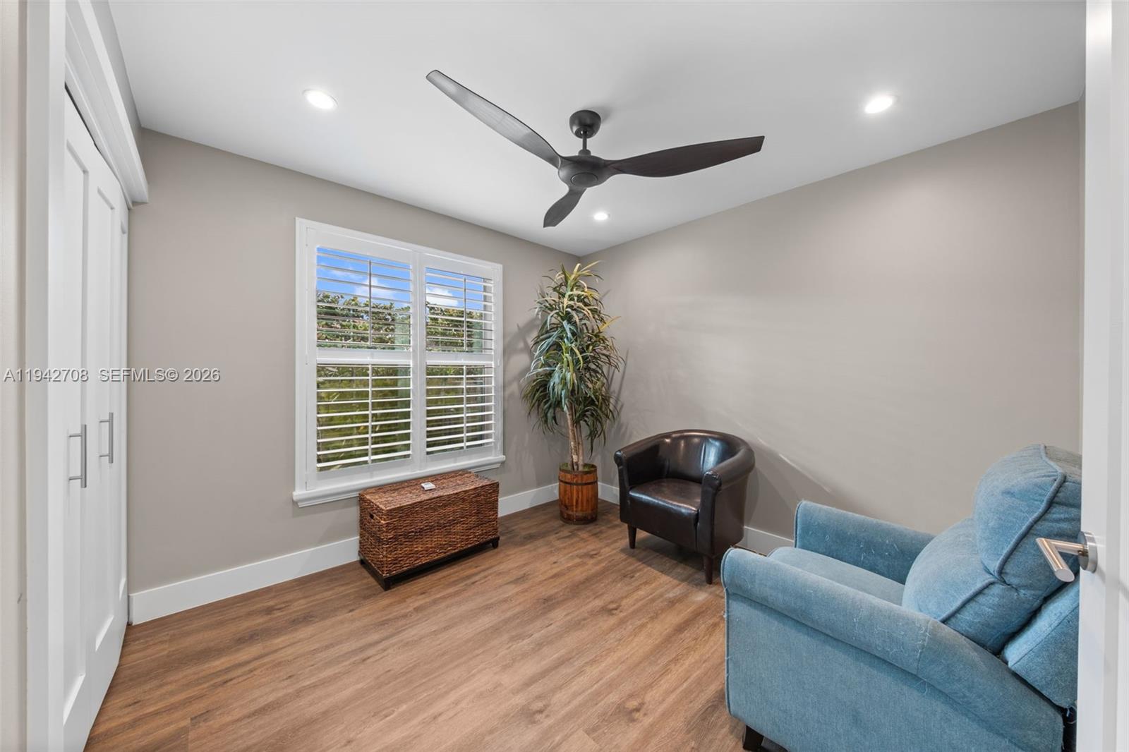 22239 Southwest 98th Place Cutler Bay, FL 33190 - Photo 18 of 67 a living room with furniture and a window