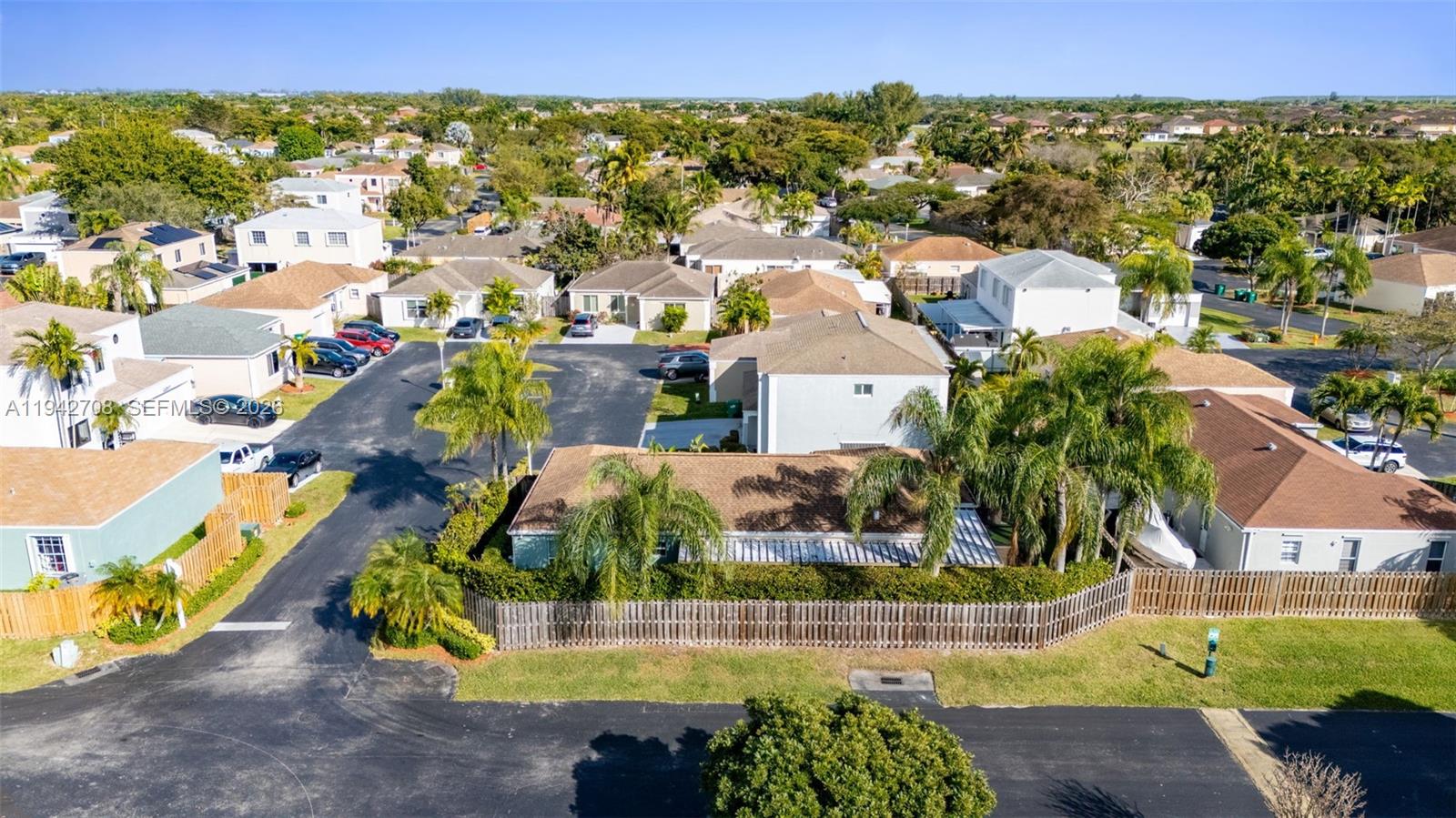 22239 Southwest 98th Place Cutler Bay, FL 33190 - Photo 23 of 67 an aerial view of a house with a swimming pool