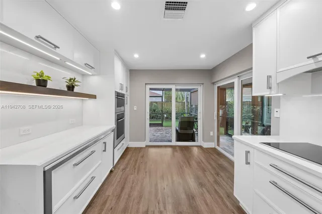 a view of washer and dryer in a utility room