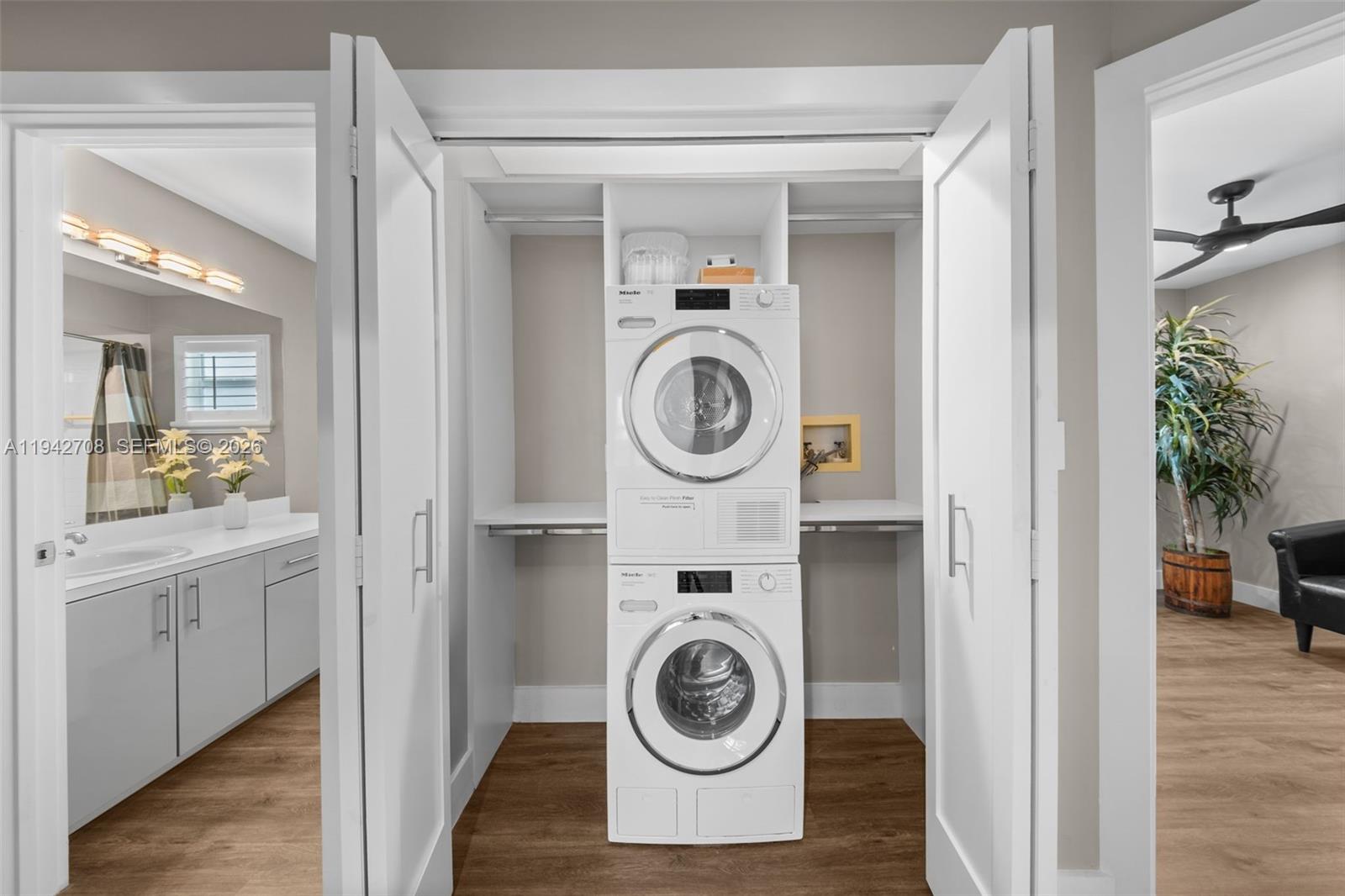 22239 Southwest 98th Place Cutler Bay, FL 33190 - Photo 38 of 67 a view of washer and dryer in a utility room