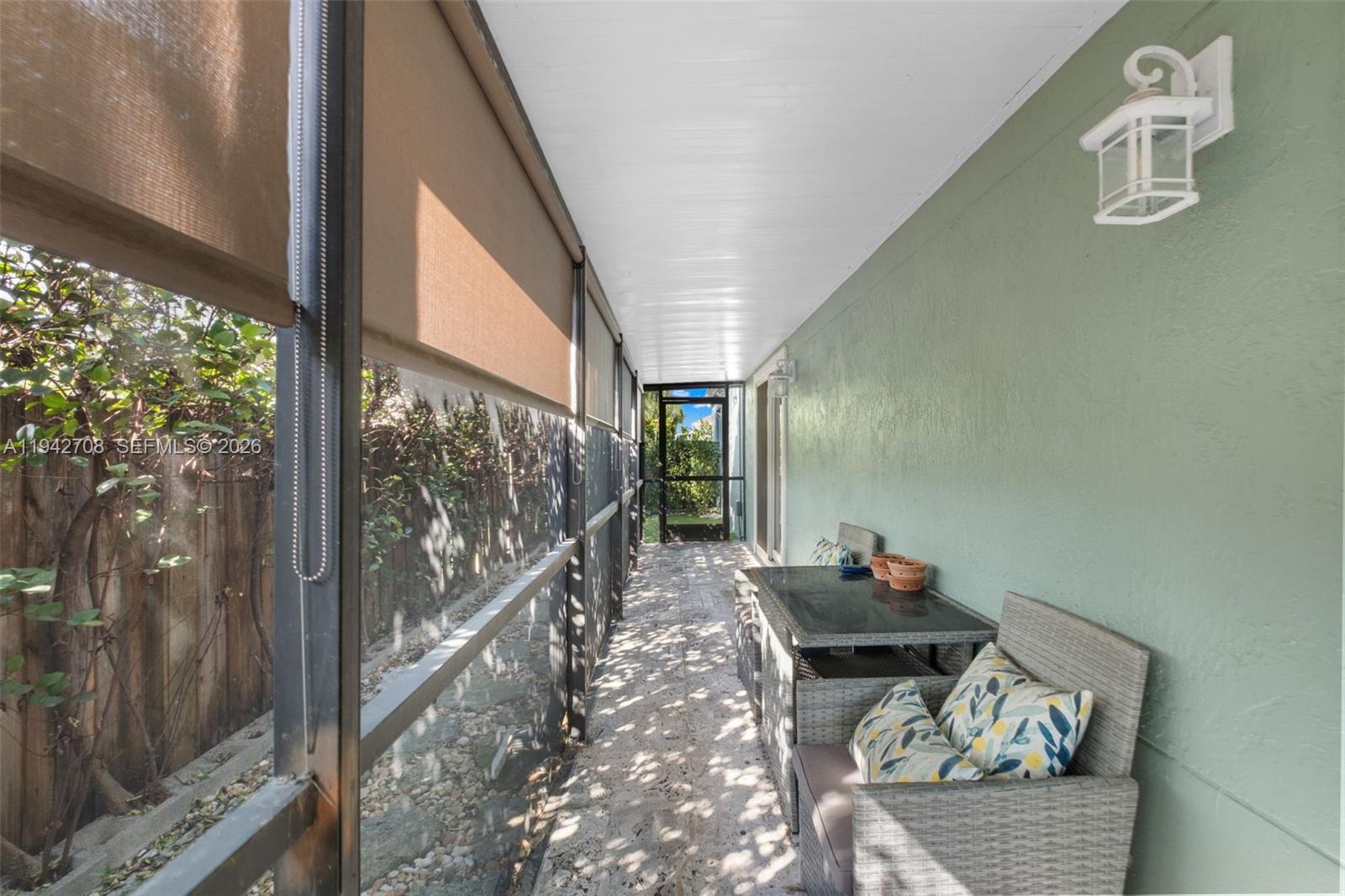 22239 Southwest 98th Place Cutler Bay, FL 33190 - Photo 43 of 67 a living room with furniture