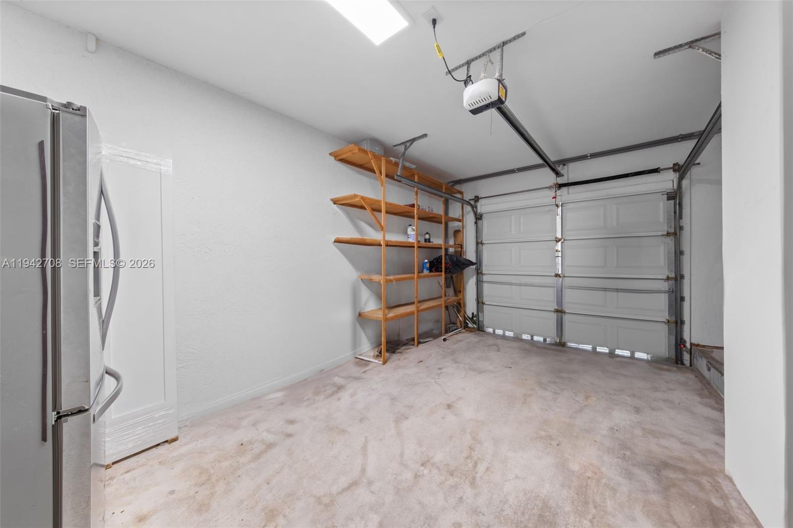 22239 Southwest 98th Place Cutler Bay, FL 33190 - Photo 47 of 67 a view of a room with storage and utility room