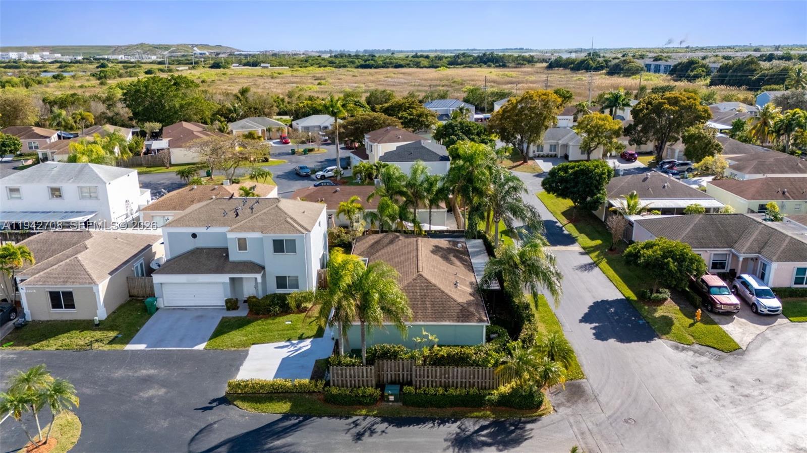 22239 Southwest 98th Place Cutler Bay, FL 33190 - Photo 59 of 67 an aerial view of multiple house