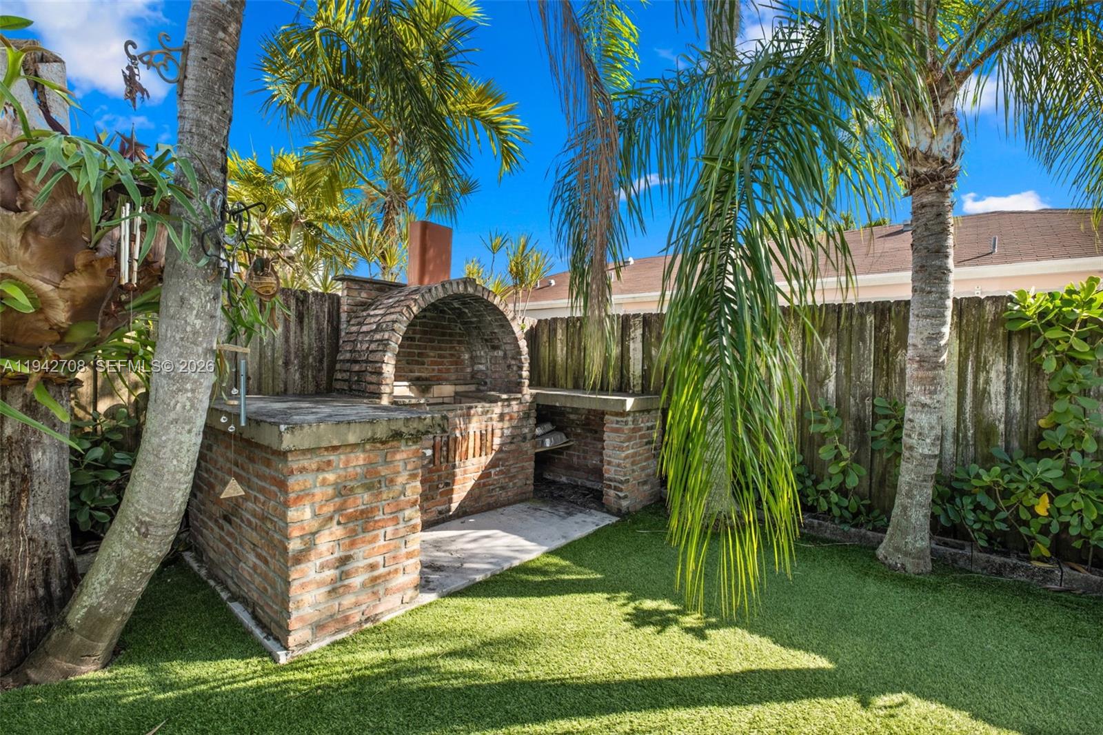 22239 Southwest 98th Place Cutler Bay, FL 33190 - Photo 7 of 67 a view of a park with a palm tree