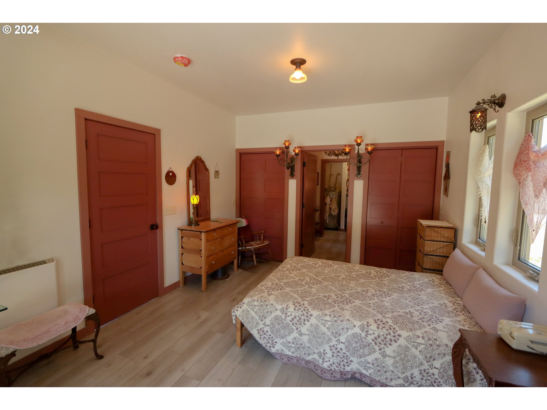 1310 Riverside Drive Northeast Bandon, OR 97411 - Photo 11 of 42 a view of a workspace with furniture and a window