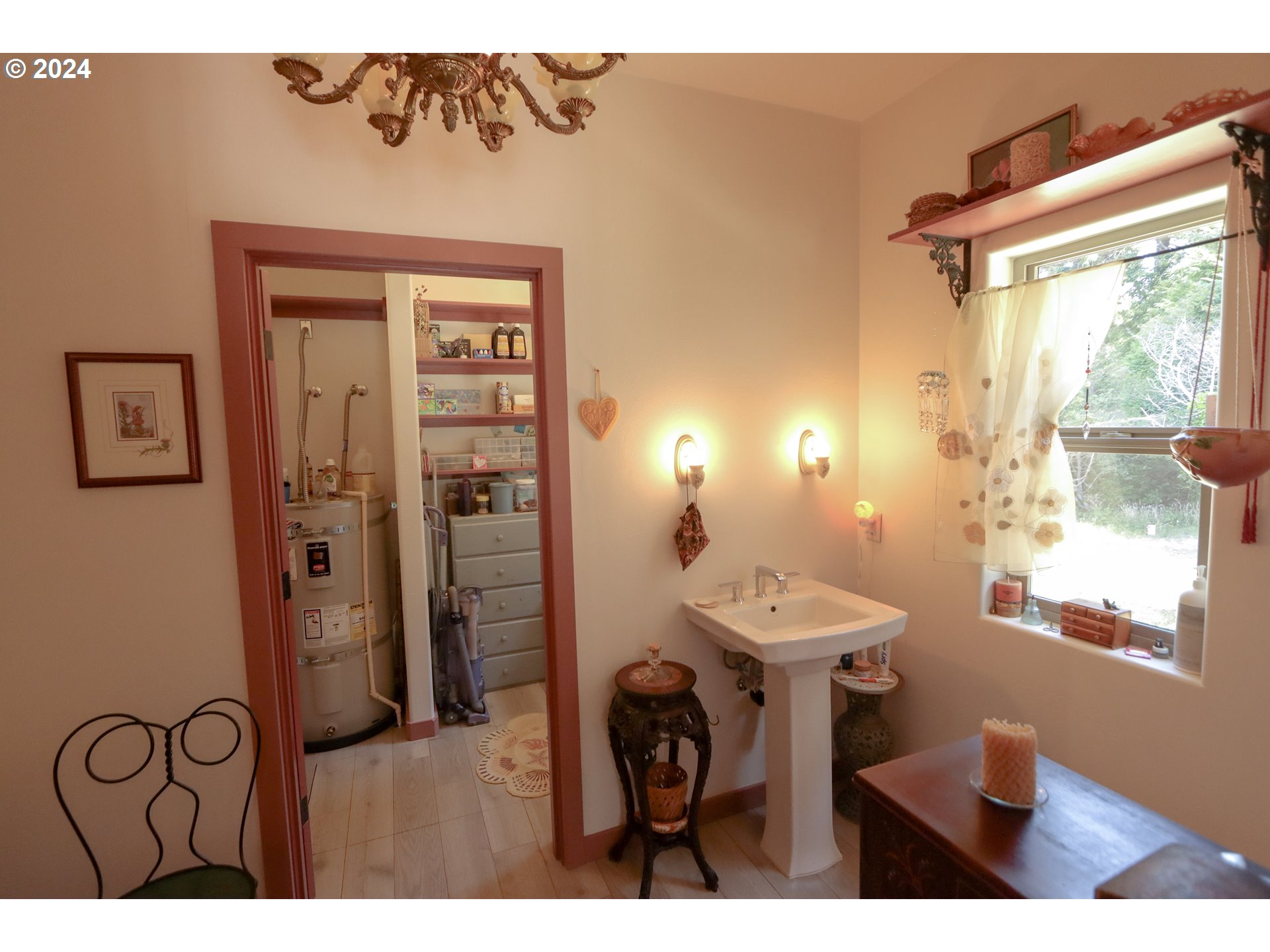 1310 Riverside Drive Northeast Bandon, OR 97411 - Photo 17 of 42 a bathroom with a sink and a mirror