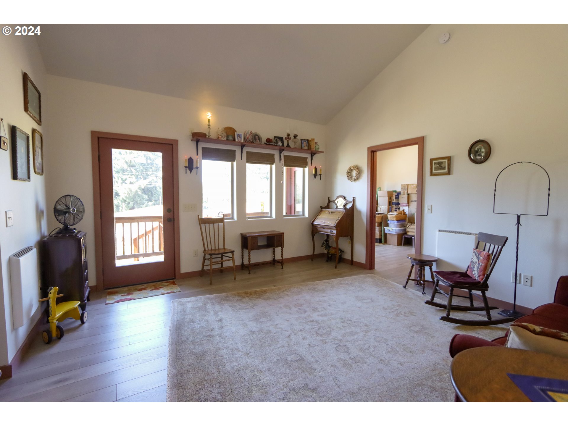 1310 Riverside Drive Northeast Bandon, OR 97411 - Photo 20 of 42 a living room with furniture and a window