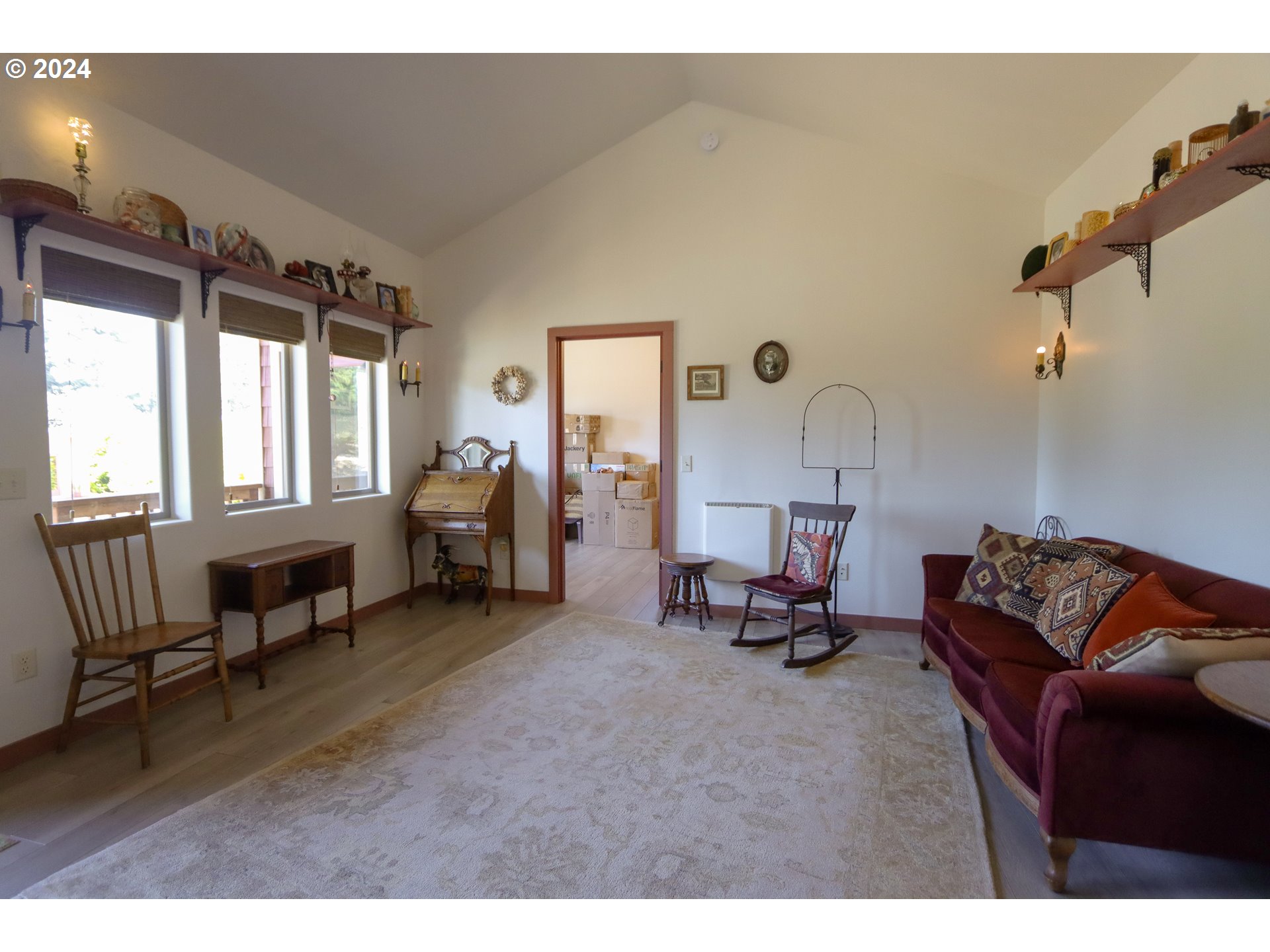 1310 Riverside Drive Northeast Bandon, OR 97411 - Photo 21 of 42 a living room with furniture and a window