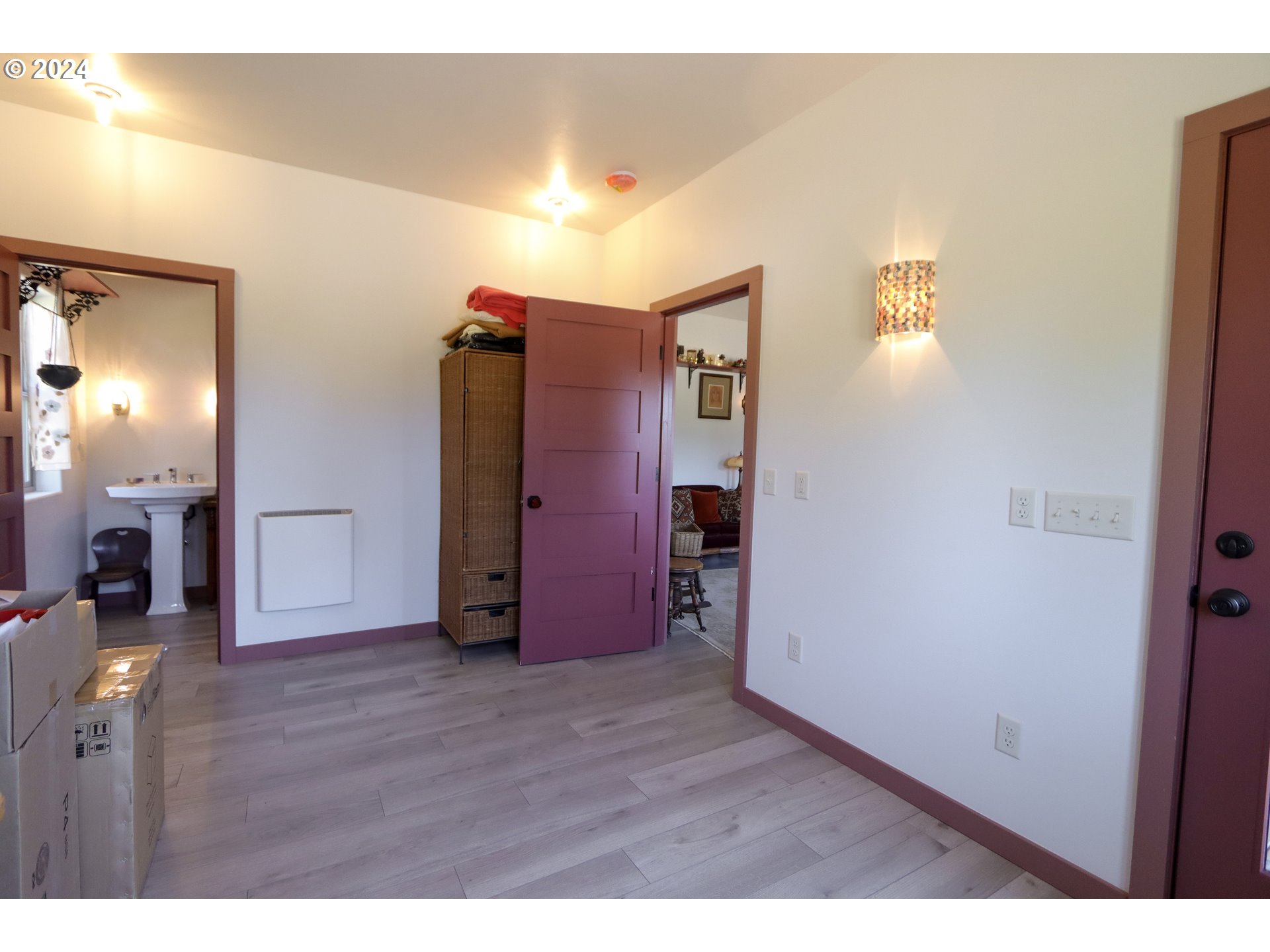 1310 Riverside Drive Northeast Bandon, OR 97411 - Photo 23 of 42 a view of a livingroom with wooden floor