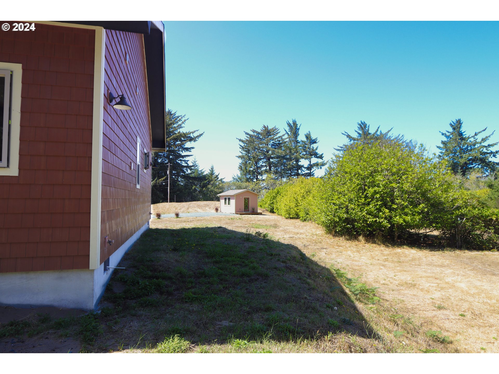 1310 Riverside Drive Northeast Bandon, OR 97411 - Photo 33 of 42 a view of a backyard