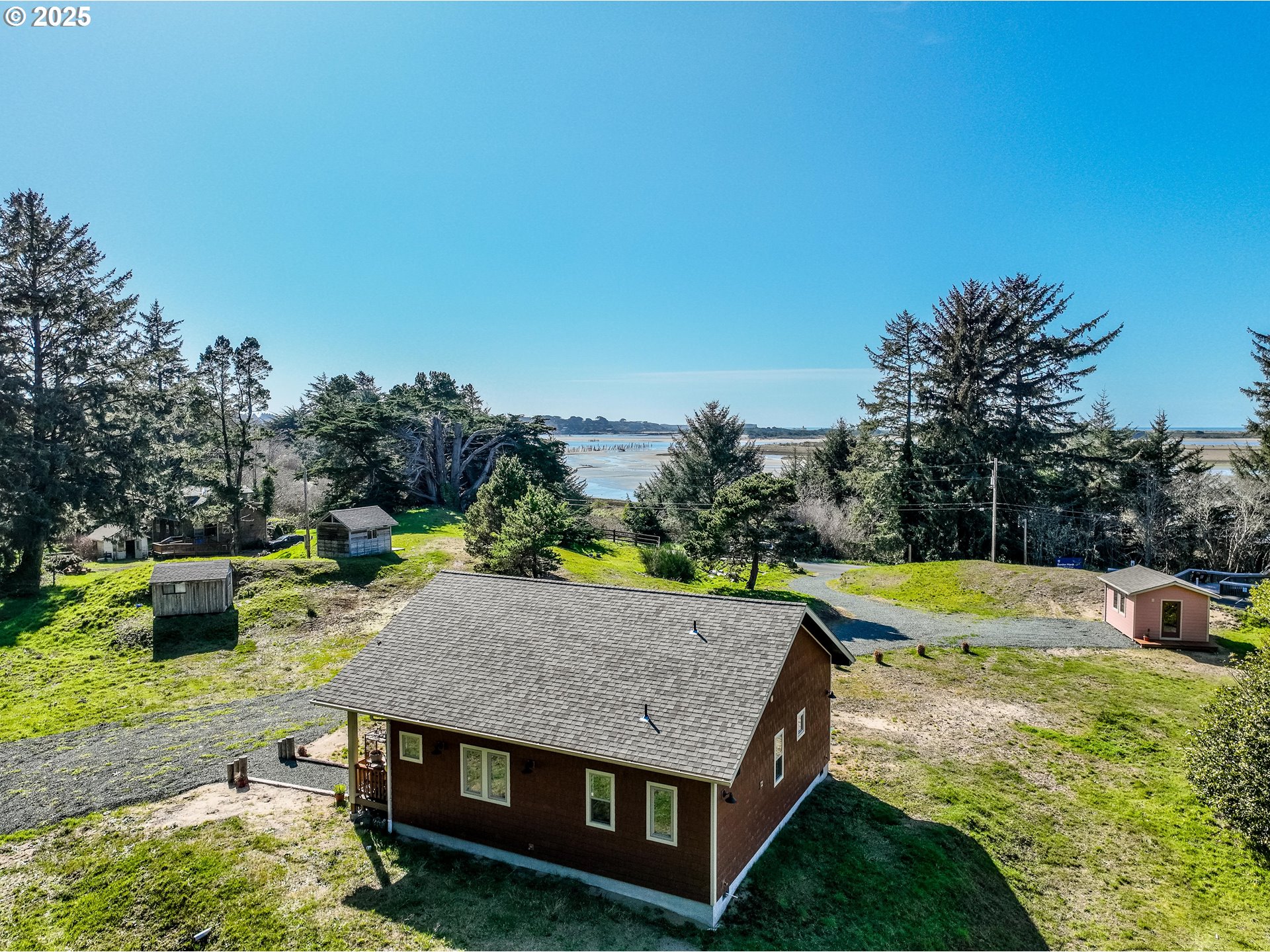 1310 Riverside Drive Northeast Bandon, OR 97411 - Photo 36 of 42 a view of a swimming pool with a patio