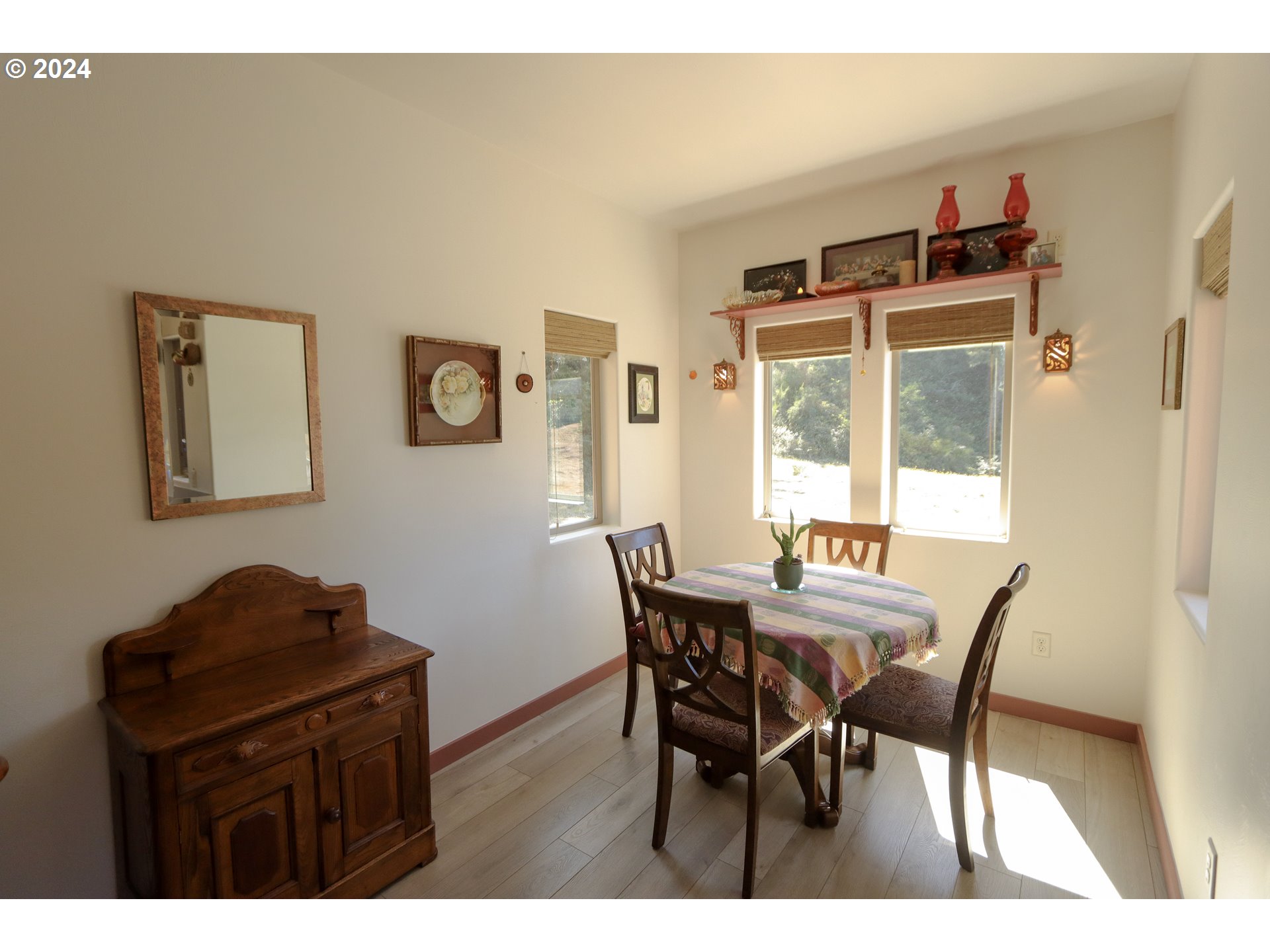 1310 Riverside Drive Northeast Bandon, OR 97411 - Photo 9 of 42 a dining room with furniture and window