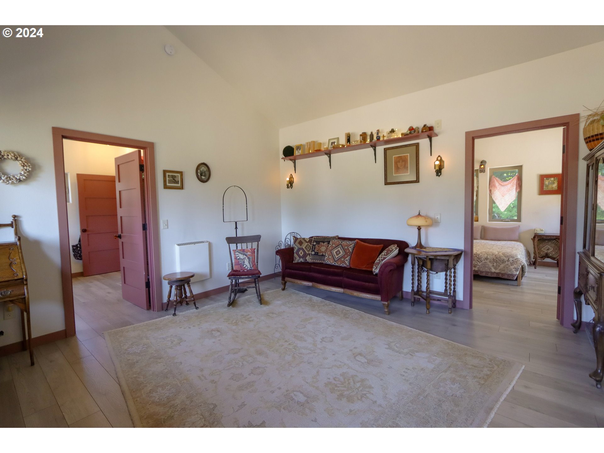 1310 Riverside Drive Northeast Bandon, OR 97411 - Photo 10 of 42 a living room with furniture and a wooden floor