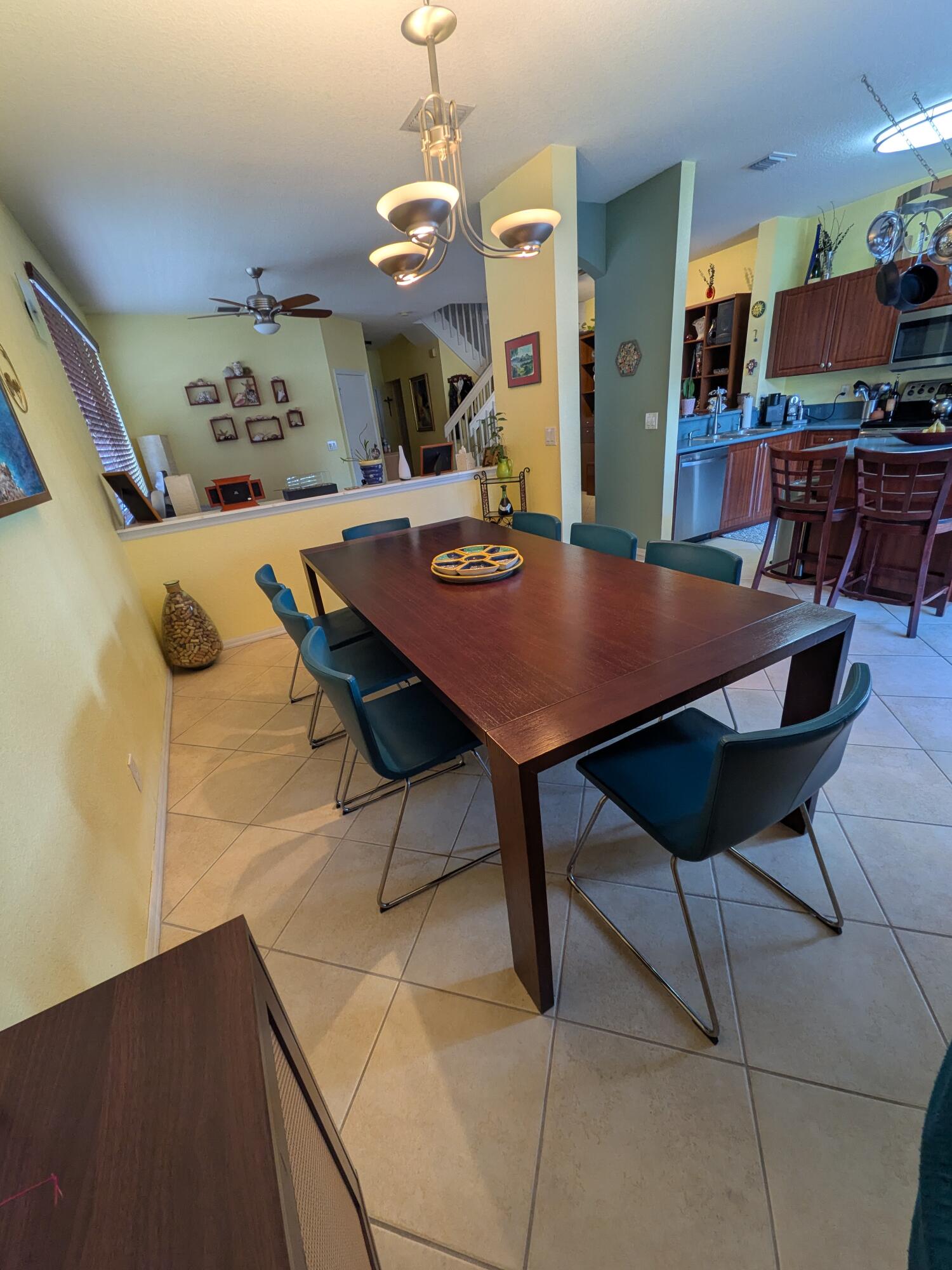 4091 Northwest 91st Terrace Sunrise, FL 33351 - Photo 13 of 41 a view of a dining room with furniture