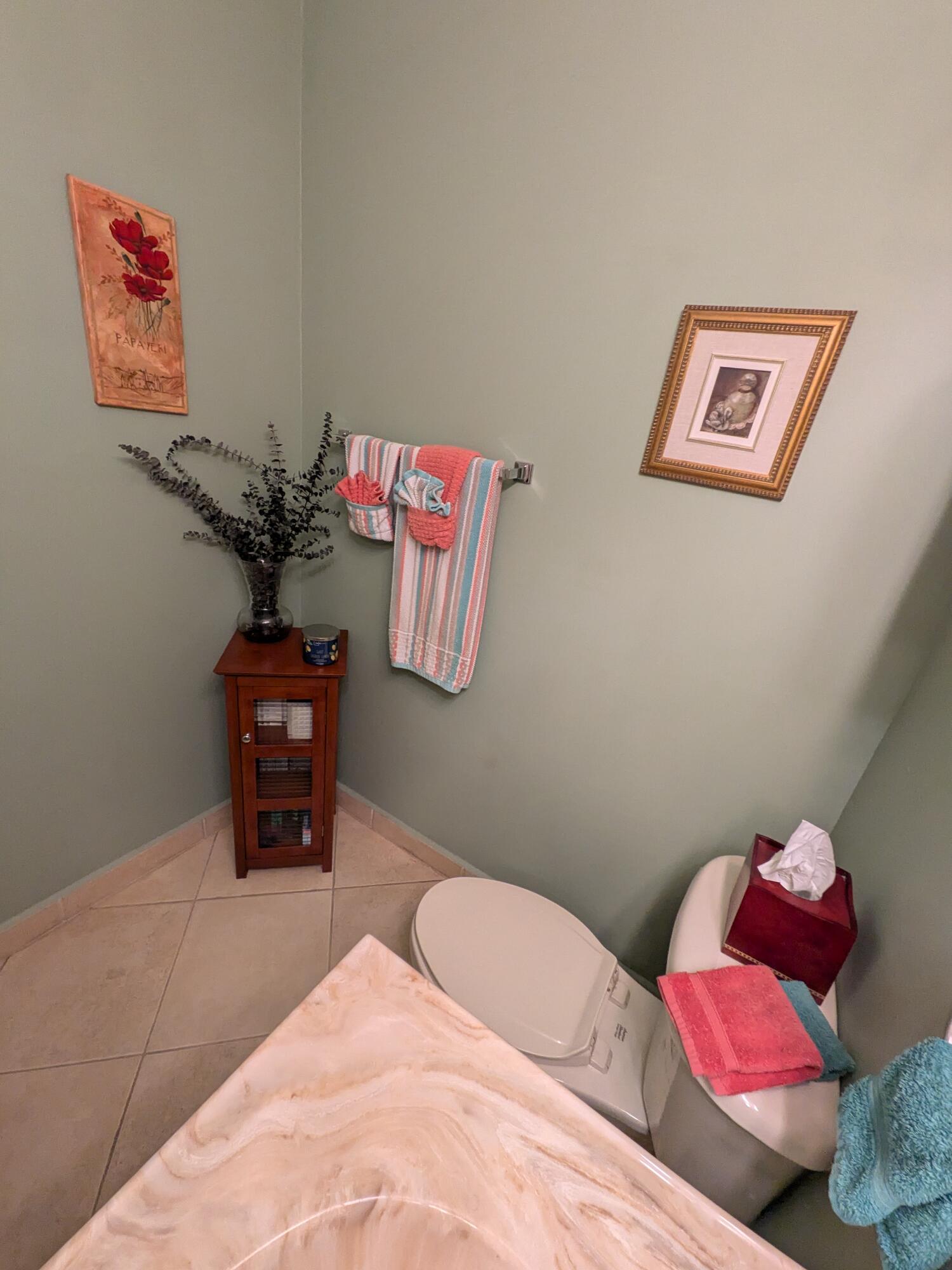 4091 Northwest 91st Terrace Sunrise, FL 33351 - Photo 16 of 41 a bedroom with a bed and a chair