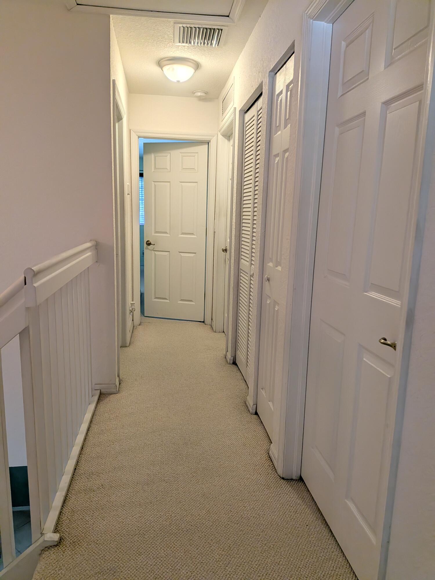 4091 Northwest 91st Terrace Sunrise, FL 33351 - Photo 21 of 41 a view of a hallway with wooden floor