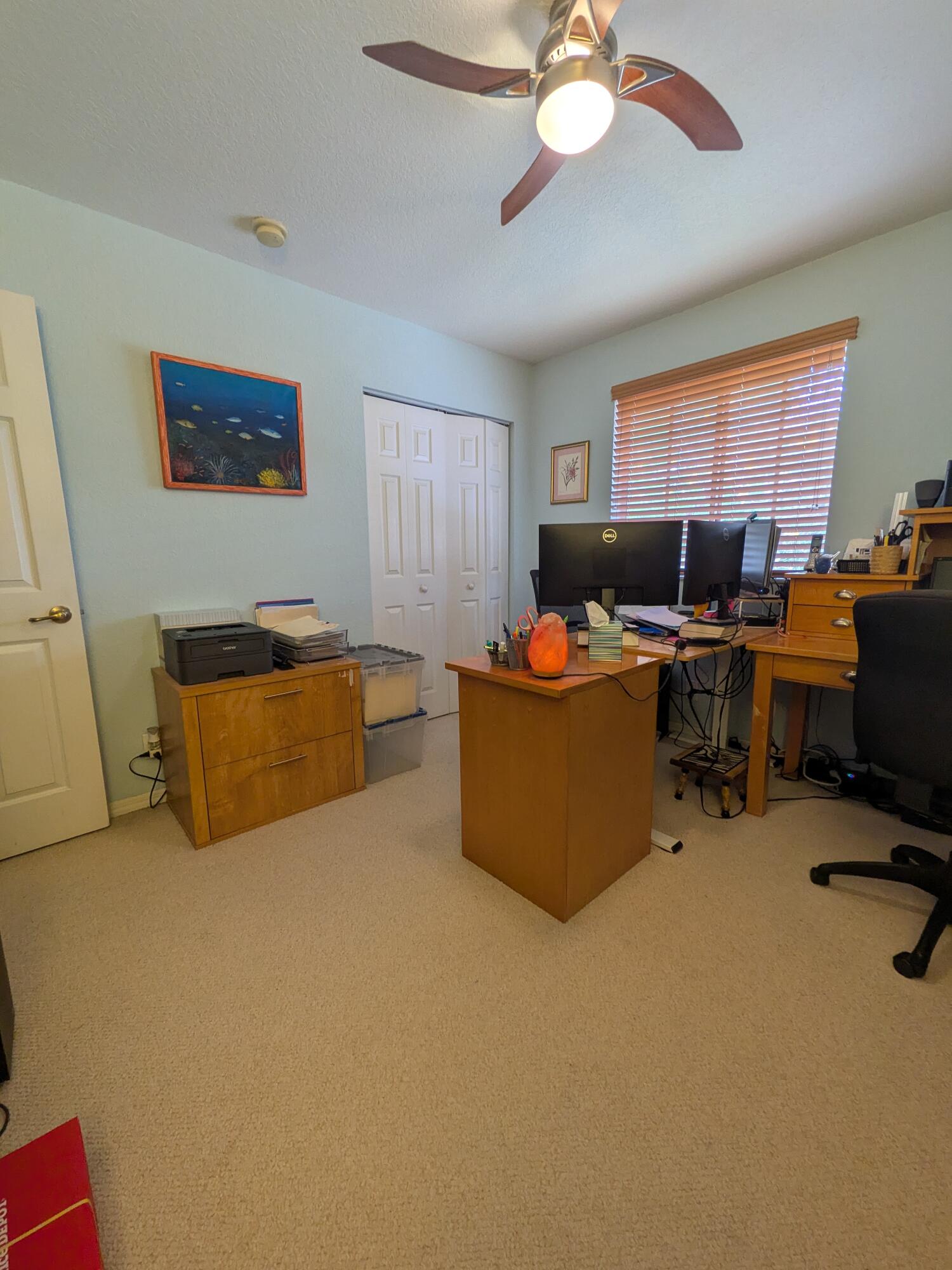4091 Northwest 91st Terrace Sunrise, FL 33351 - Photo 22 of 41 a living room with furniture and a window