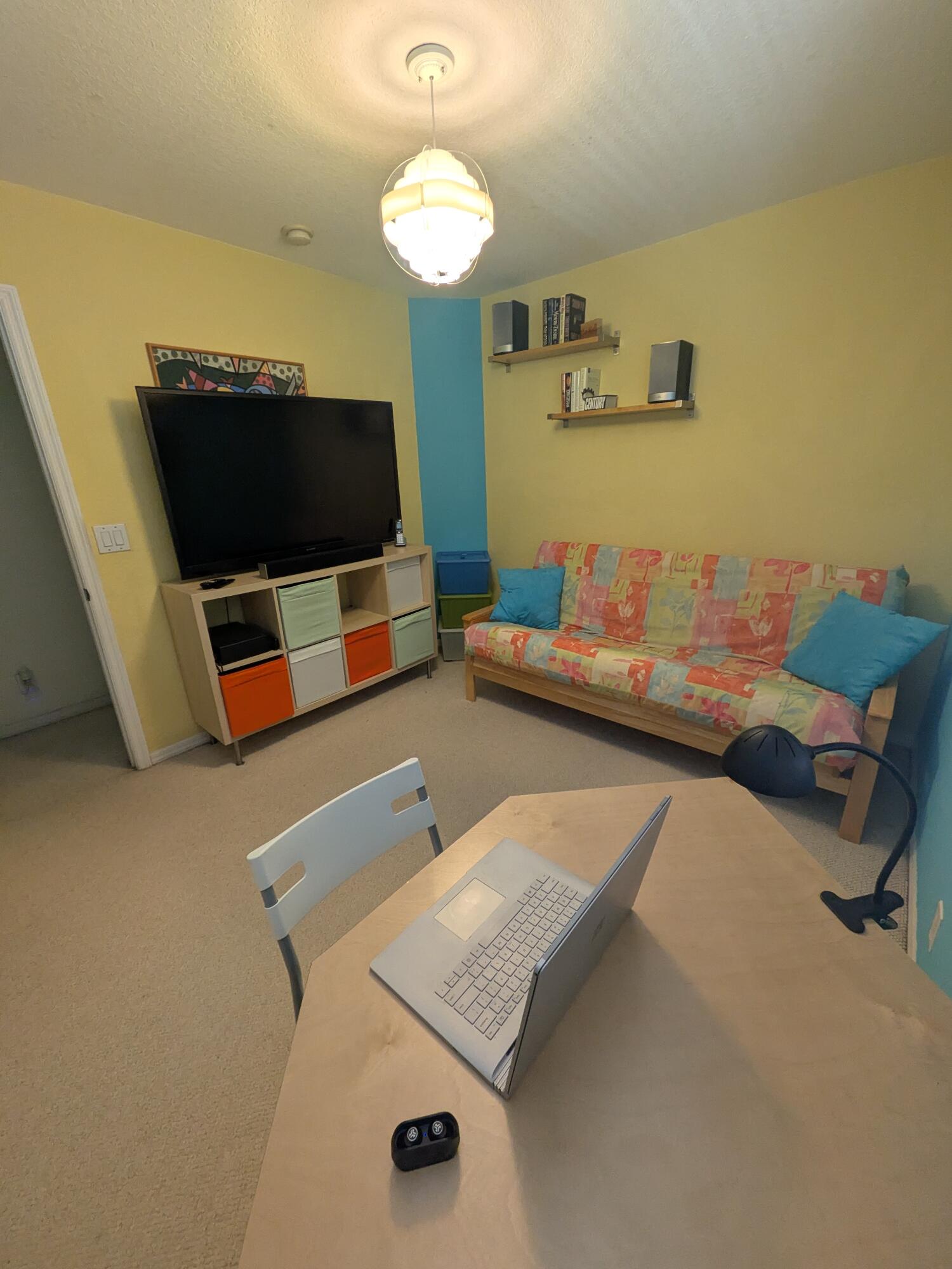 4091 Northwest 91st Terrace Sunrise, FL 33351 - Photo 28 of 41 a living room with furniture and a flat screen tv