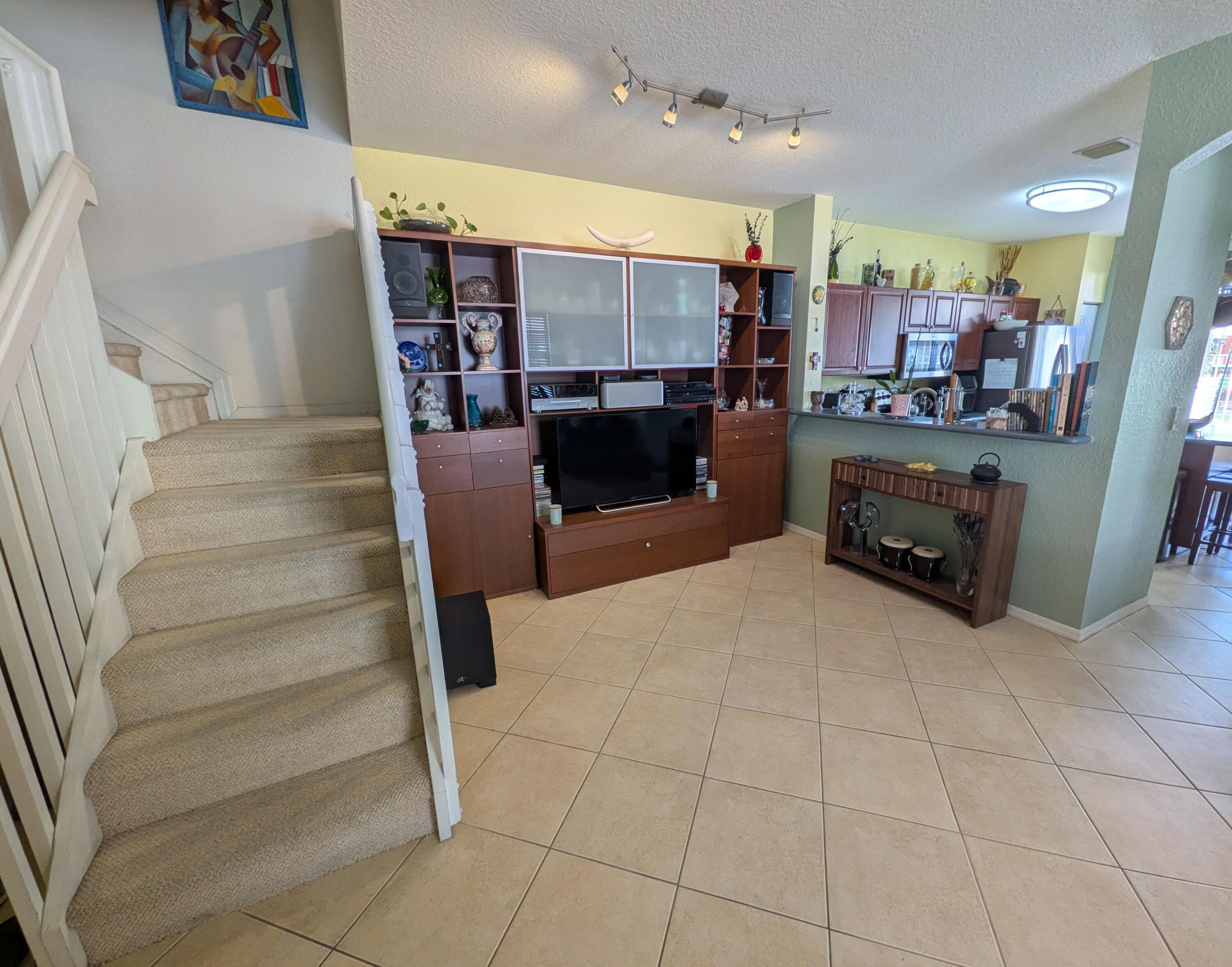 4091 Northwest 91st Terrace Sunrise, FL 33351 - Photo 8 of 41 a living room with furniture and a fireplace