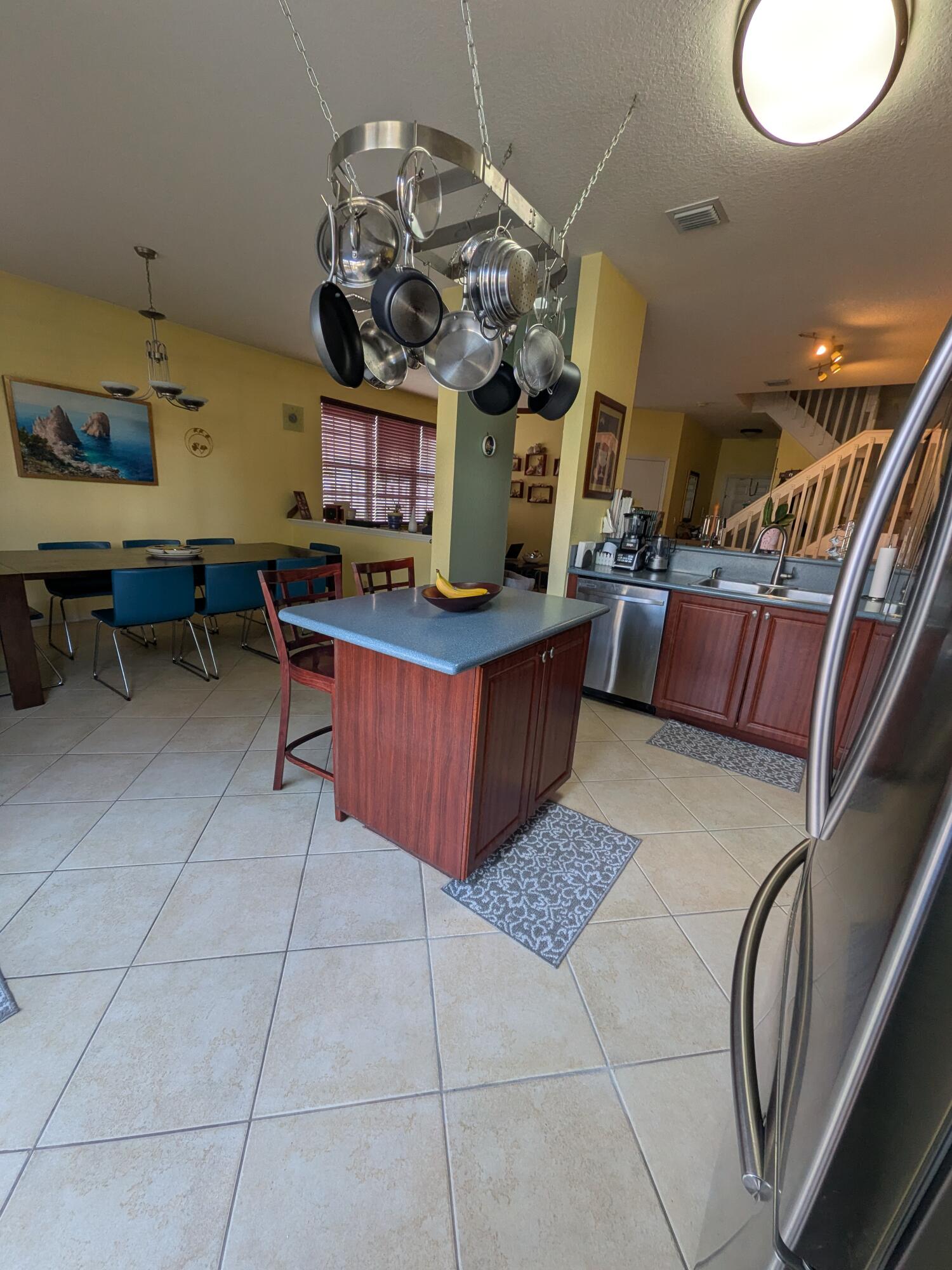 4091 Northwest 91st Terrace Sunrise, FL 33351 - Photo 10 of 41 a room with lots of furniture and clutter