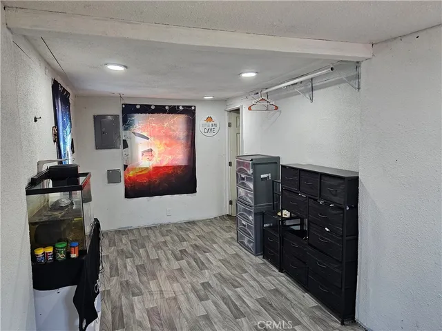 a room with furniture and a flat screen tv