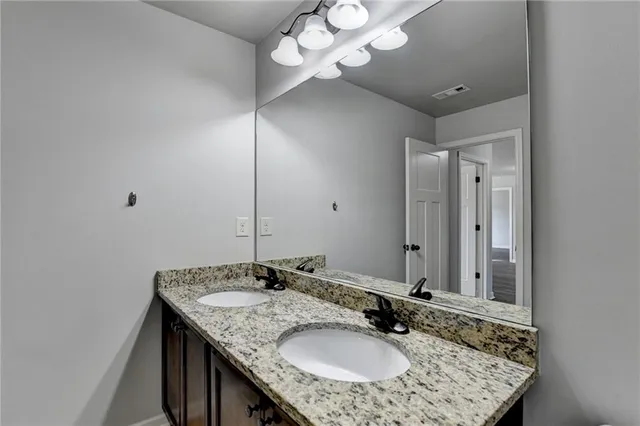 an aerial view of a swimming pool and outdoor space