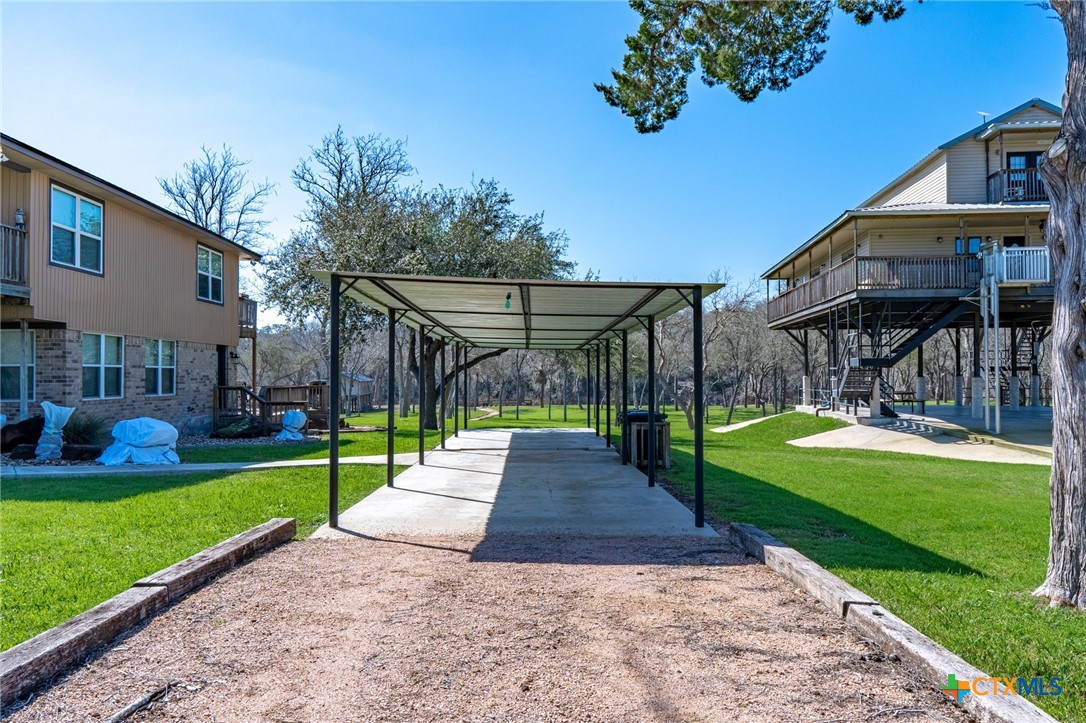 582 Cypress Valley Road Cuero, TX 77954 - Photo 15 of 36 a view of a house with a yard porch and sitting area