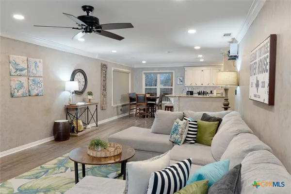a living room with furniture and a table