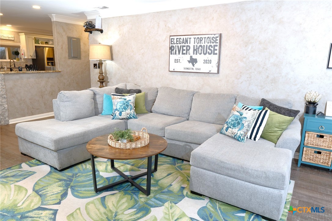 582 Cypress Valley Road Cuero, TX 77954 - Photo 30 of 36 a living room with furniture and a table