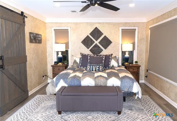a view of a livingroom with a flat screen tv
