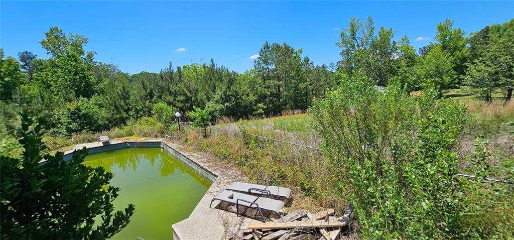 944 Lite-N-Tie Road Macon, GA 31211 - Photo 30 of 36 a view of a backyard with swimming pool