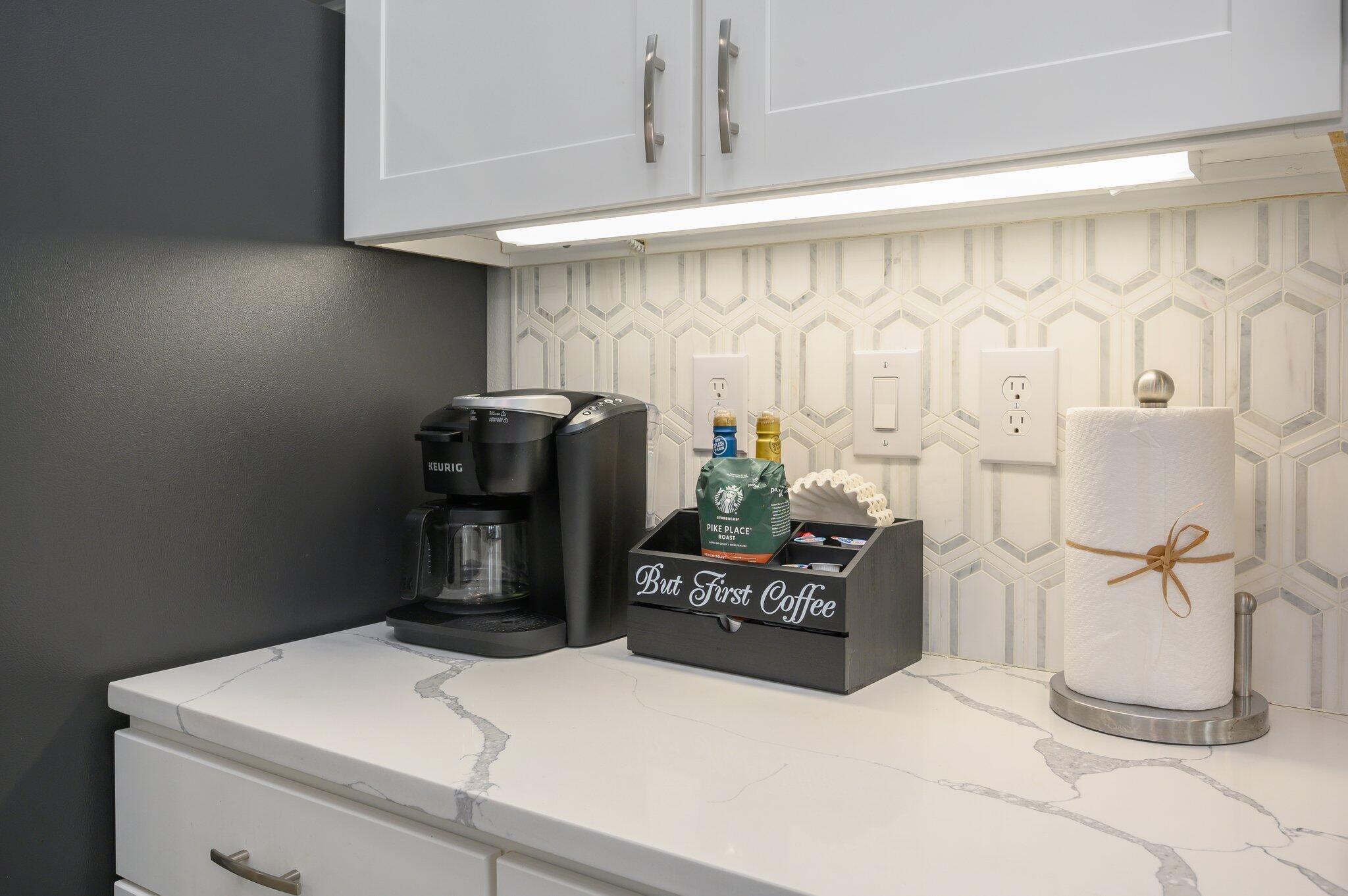 1740 South Co Highway 393, Unit 111 Santa Rosa Beach, FL 32459 - Photo 5 of 35 a kitchen with stainless steel appliances kitchen island granite countertop a refrigerator and a stove