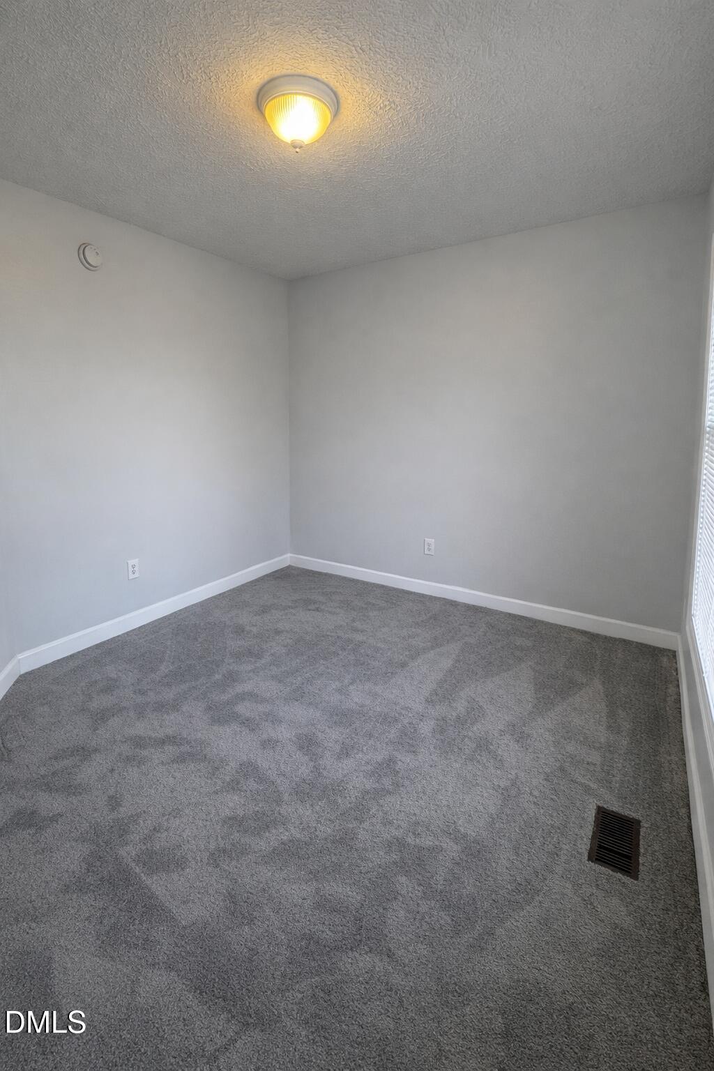 1420 East Lane Street Raleigh, NC 27610 - Photo 19 of 26 an empty room with a empty space