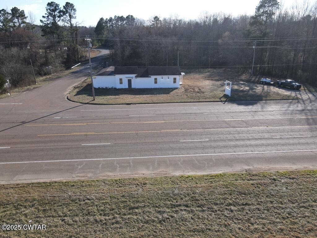 600 Highway 64 Adamsville, TN 38310 - Photo 2 of 25 a view of a water pond with an outdoor
