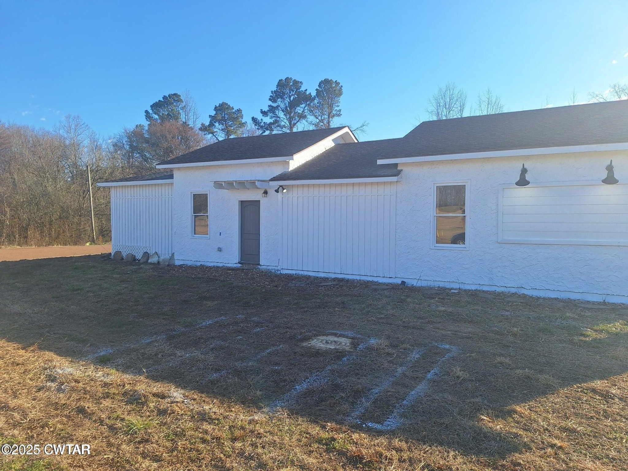600 Highway 64 Adamsville, TN 38310 - Photo 25 of 25 a view of a house with a yard