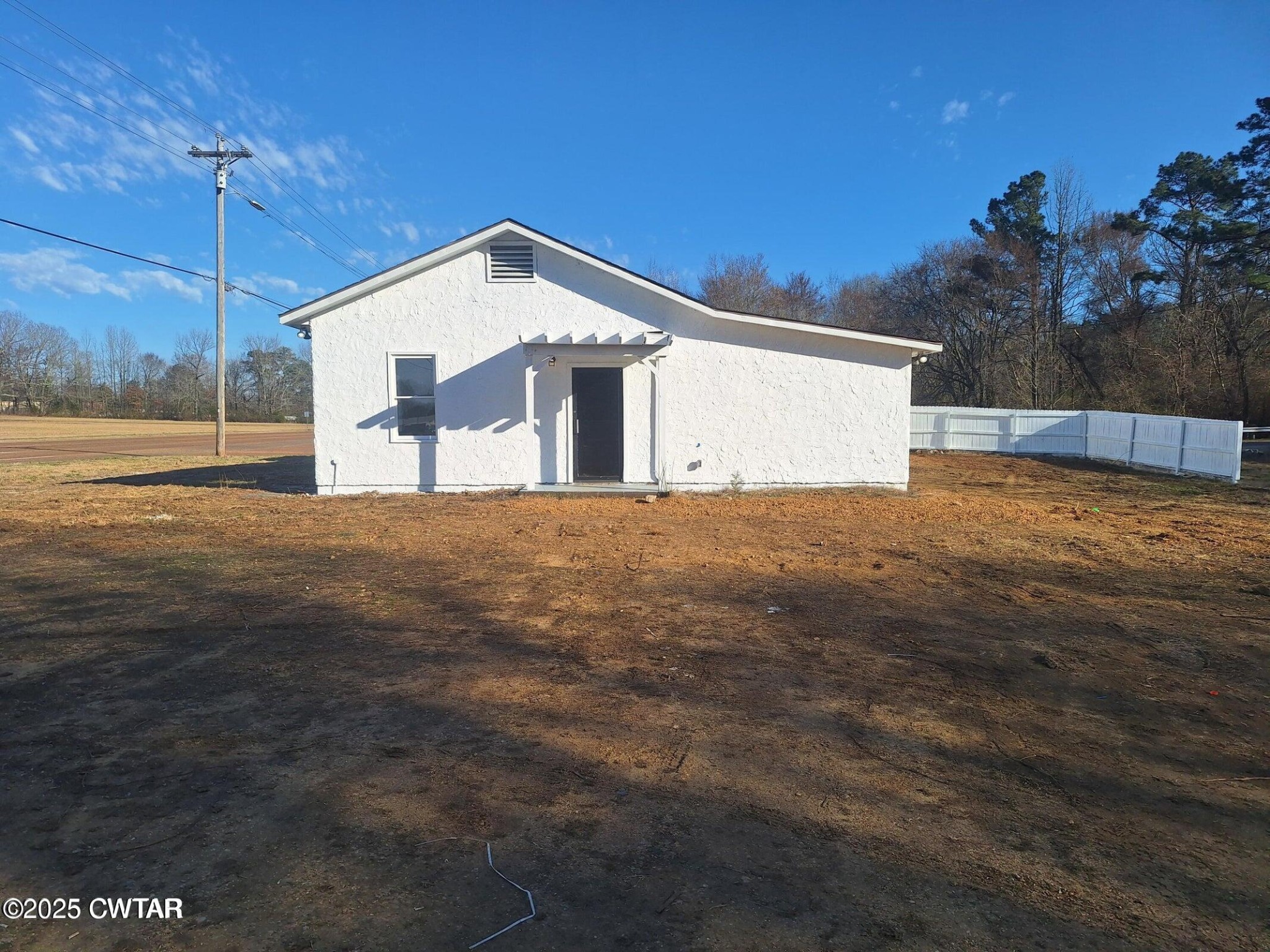 600 Highway 64 Adamsville, TN 38310 - Photo 5 of 25 a view of a house with a yard