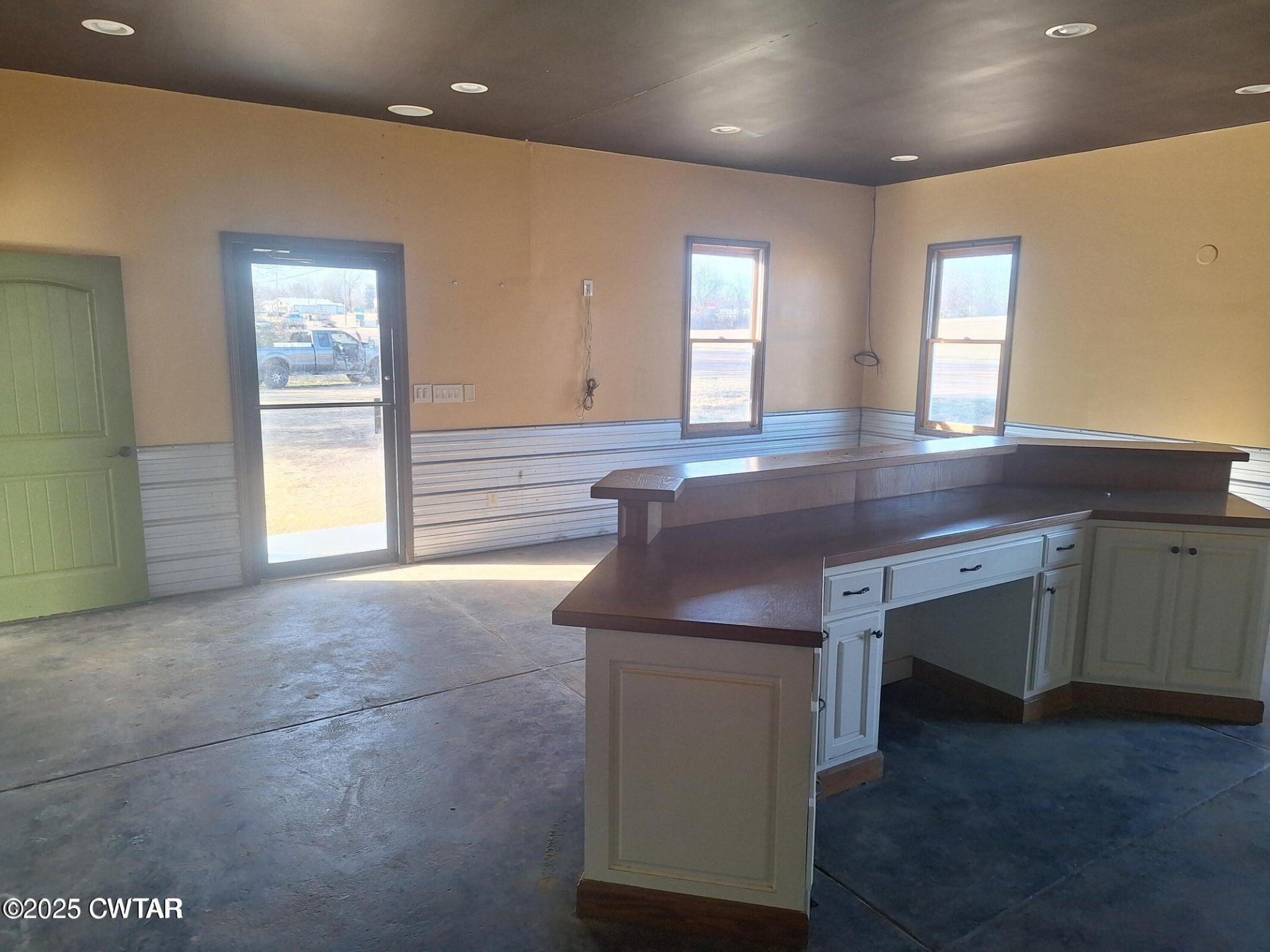 600 Highway 64 Adamsville, TN 38310 - Photo 6 of 25 a kitchen with a sink and chandelier