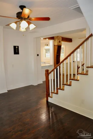 a view of entryway with wooden floor
