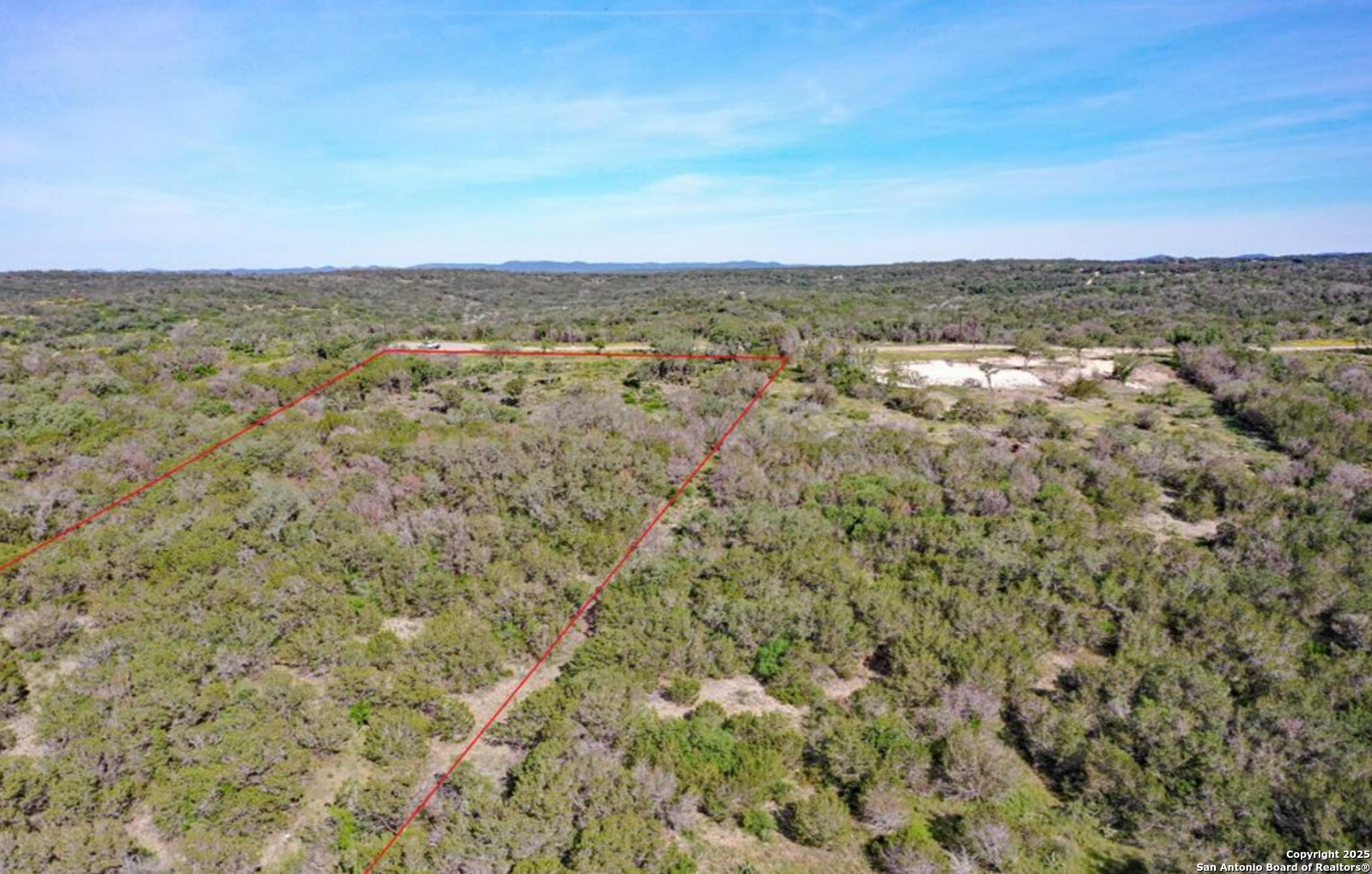 194 Crescent Ridge Hondo, TX 78861 - Photo 5 of 6 an aerial view of residential houses with outdoor space