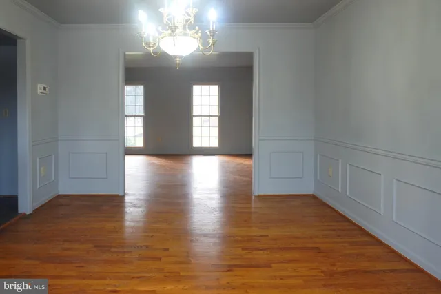 a utility room with sink dryer and washer