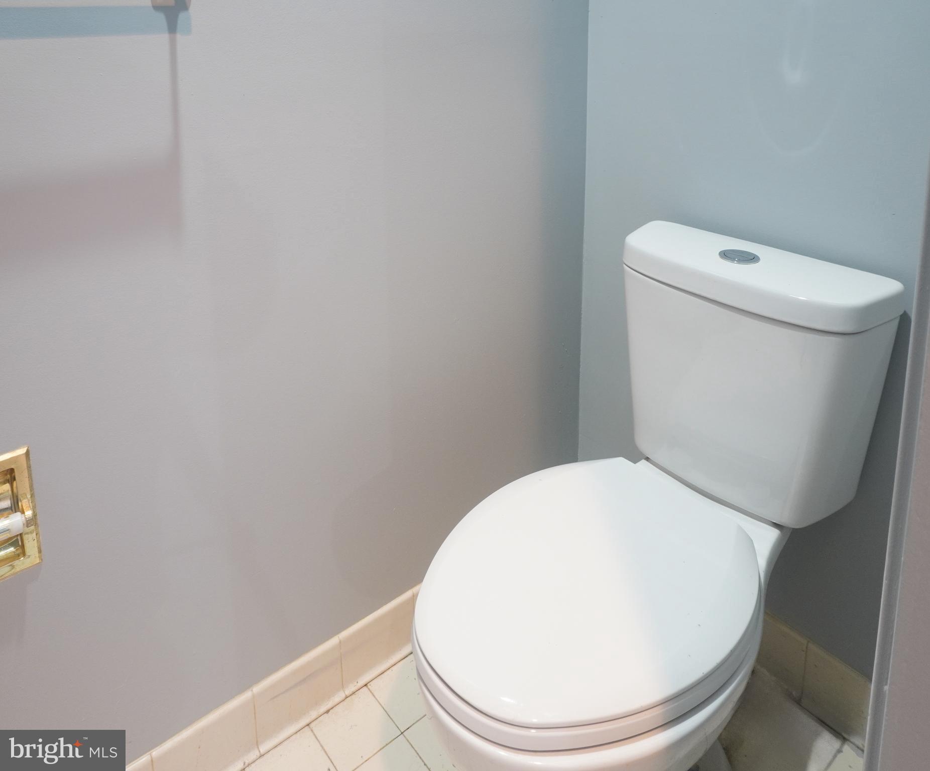 1509 Baytree Terrace Bowie, MD 20721 - Photo 42 of 45 a white toilet sitting next to a white wall