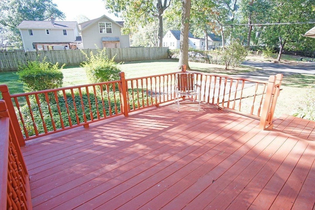 33 Harper Street Springfield, MA 01108 - Photo 7 of 22 a view of a pathway with a wrought fence