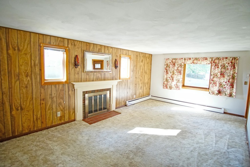 33 Harper Street Springfield, MA 01108 - Photo 8 of 22 an empty room with windows and closet