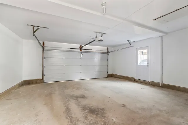 a view of an empty room with windows