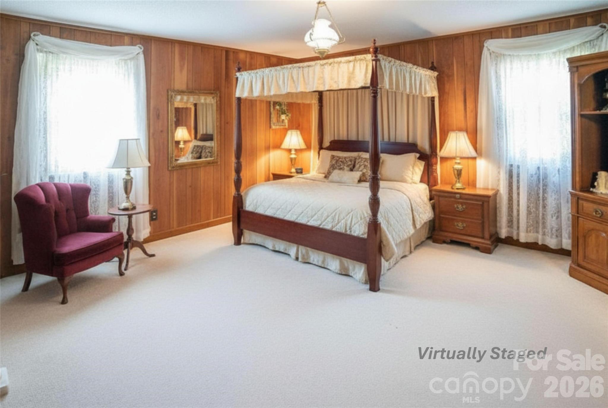1368 Cajah Mountain Road Hudson, NC 28638 - Photo 17 of 39 a bedroom with a bed and a couch