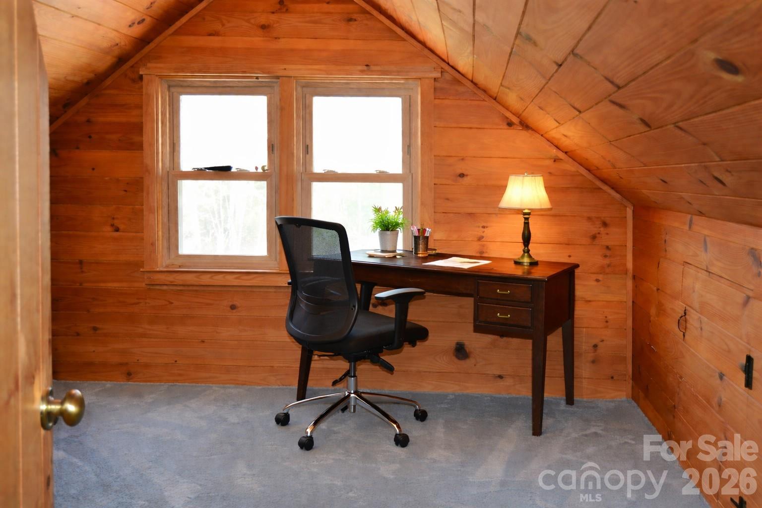 1368 Cajah Mountain Road Hudson, NC 28638 - Photo 21 of 39 a view of a workspace with furniture and a window