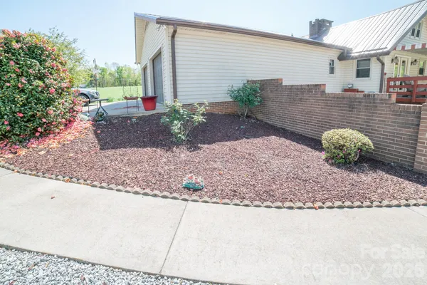 a front view of a house with a garage