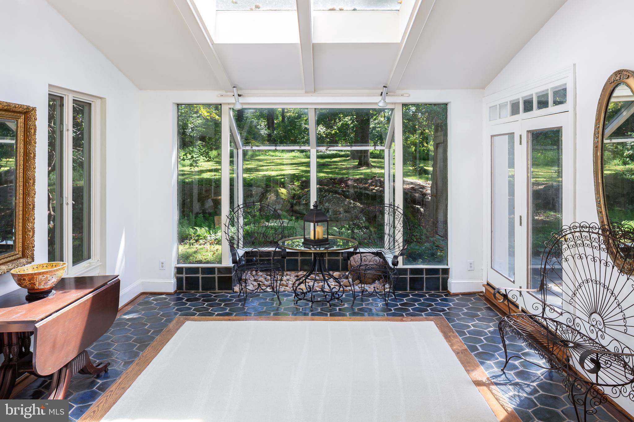 8 Fox Chase Road Malvern, PA 19355 - Photo 12 of 49 a living room with furniture and large windows