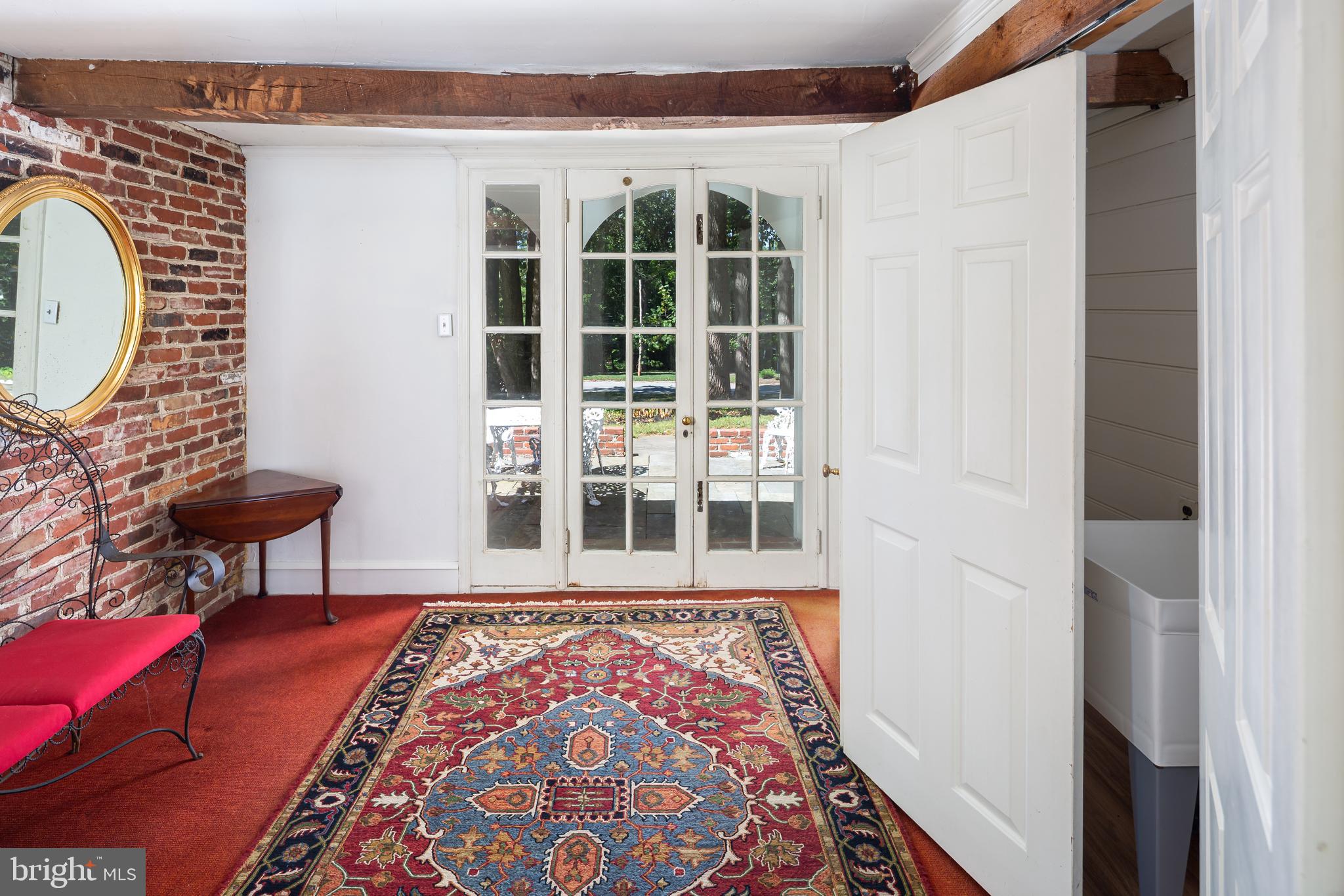 8 Fox Chase Road Malvern, PA 19355 - Photo 23 of 49 a view of a bedroom with wooden floor and a window