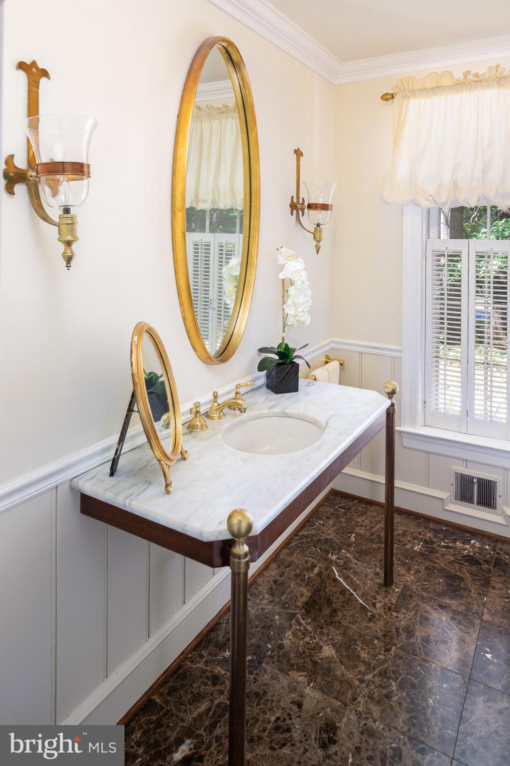 8 Fox Chase Road Malvern, PA 19355 - Photo 24 of 49 a view of a bathroom with a sink and a mirror